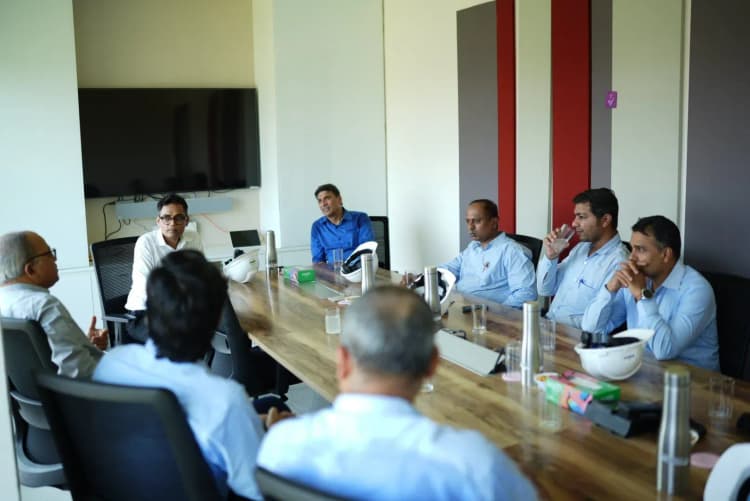 Aarti Industries employees performing safety-focused duties in industrial environment