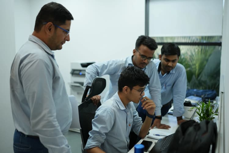 Workers focused on safe and efficient operations within Aarti Industries facility